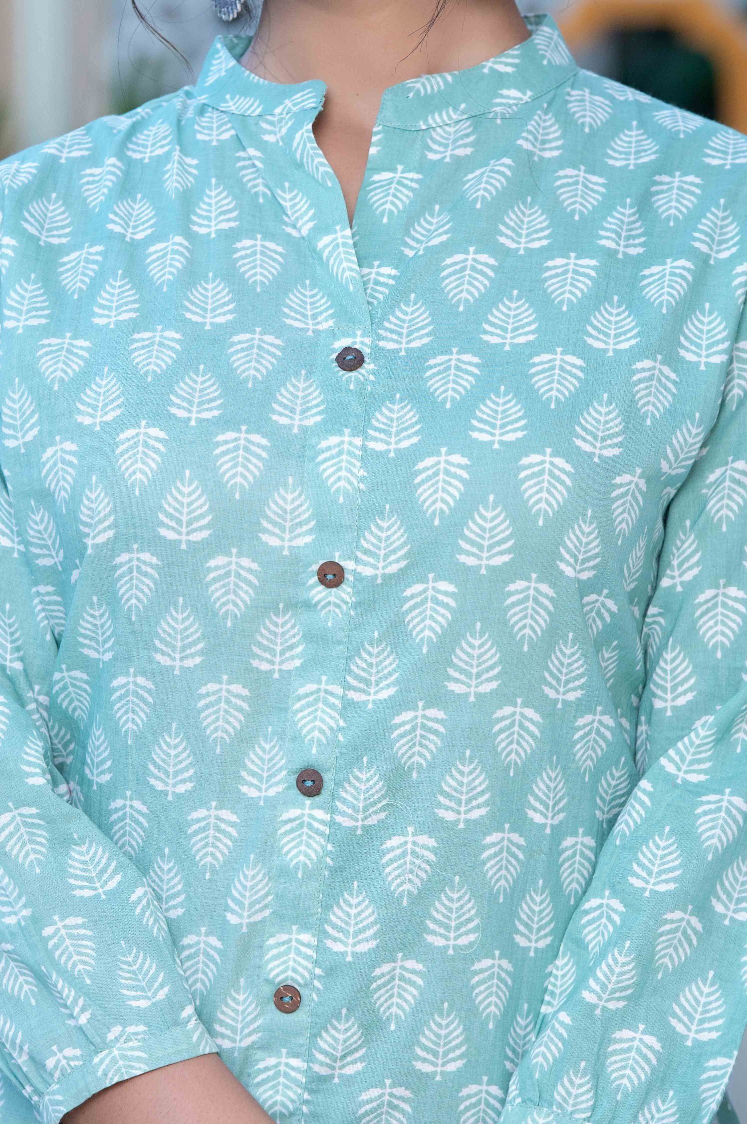 Sky Blue Short Kurti With White Leaf Buti 2